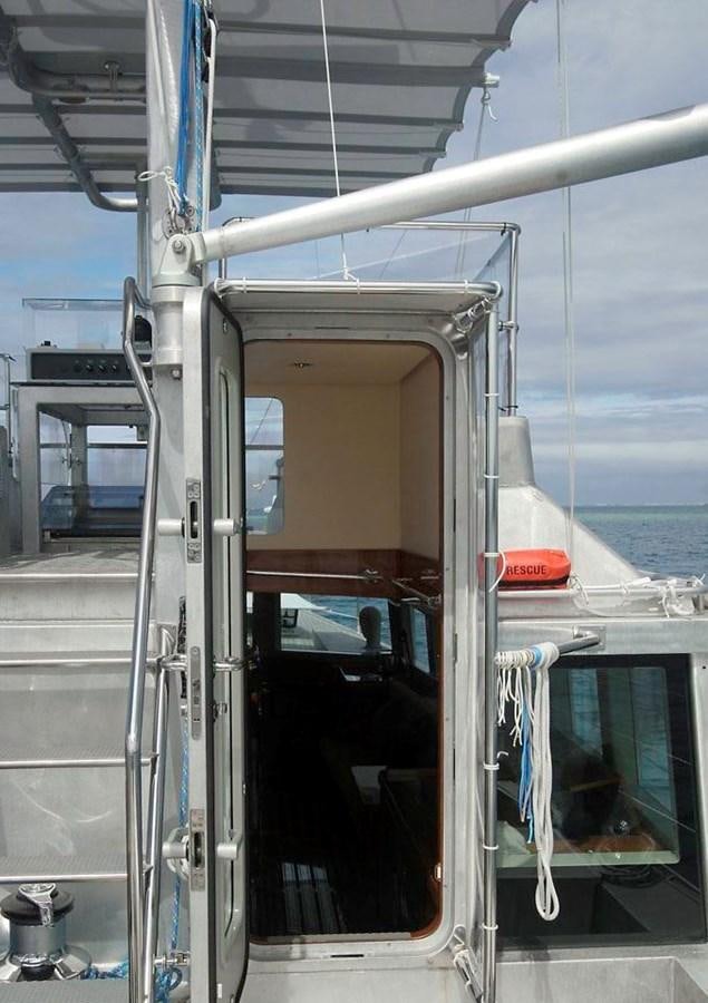 a boat with a door open aboard WIND HORSE Yacht for Sale