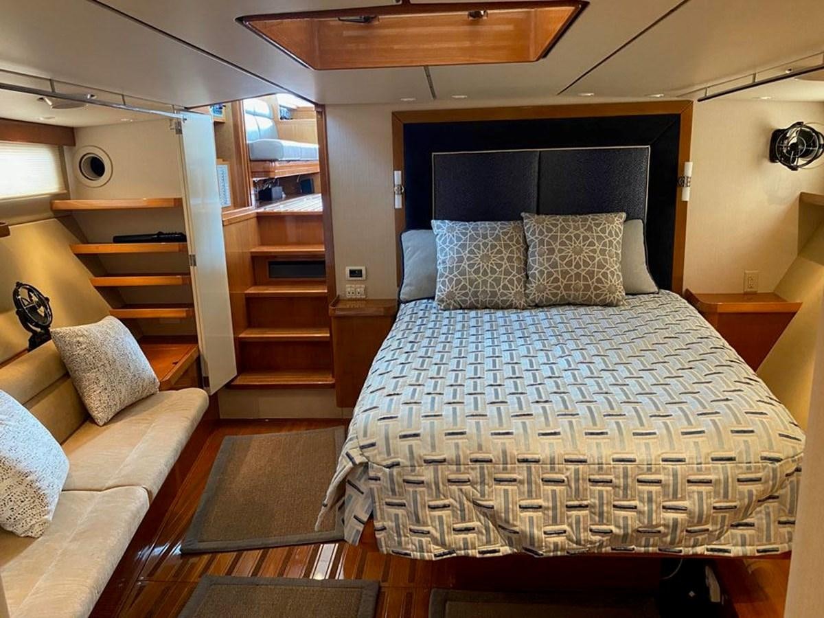 a bed in a room aboard WIND HORSE Yacht for Sale