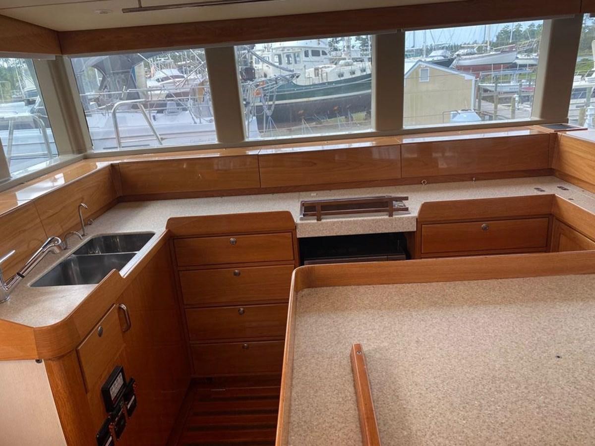 a room with a sink and a window aboard WIND HORSE Yacht for Sale