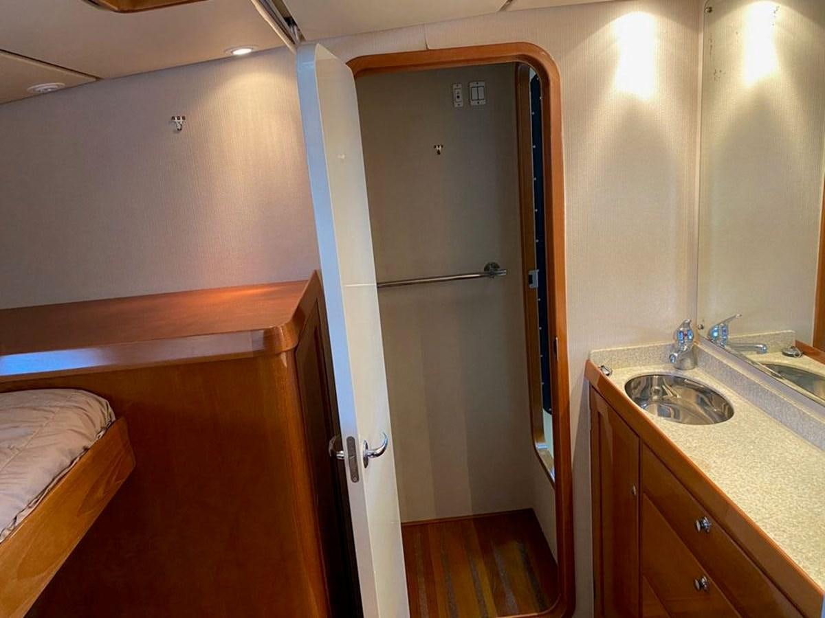 a bathroom with a shower and sink aboard WIND HORSE Yacht for Sale