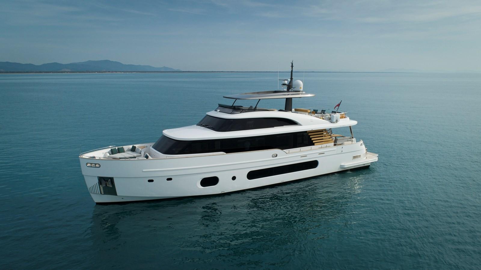 a white yacht in the water aboard ANDALA Yacht for Sale