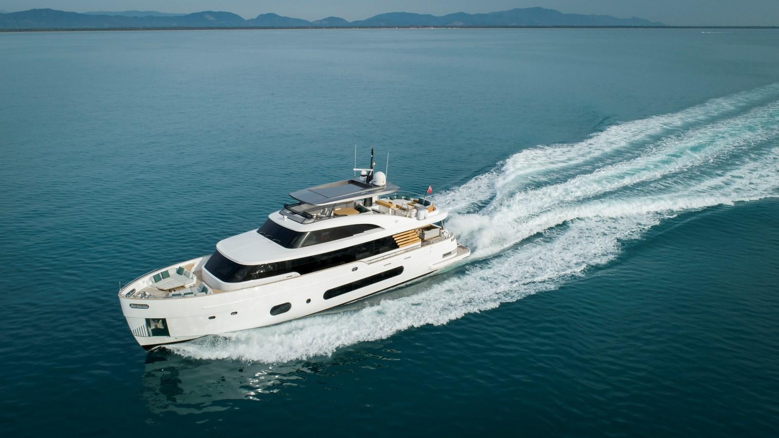 a white boat on the water aboard ANDALA Yacht for Sale