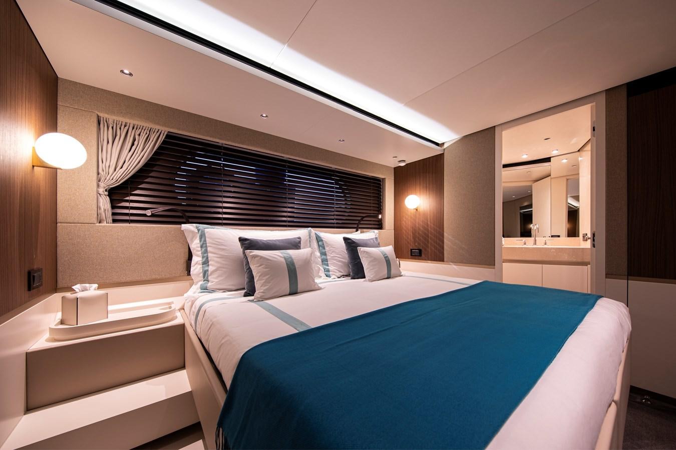 a room with two beds aboard ANDALA Yacht for Sale
