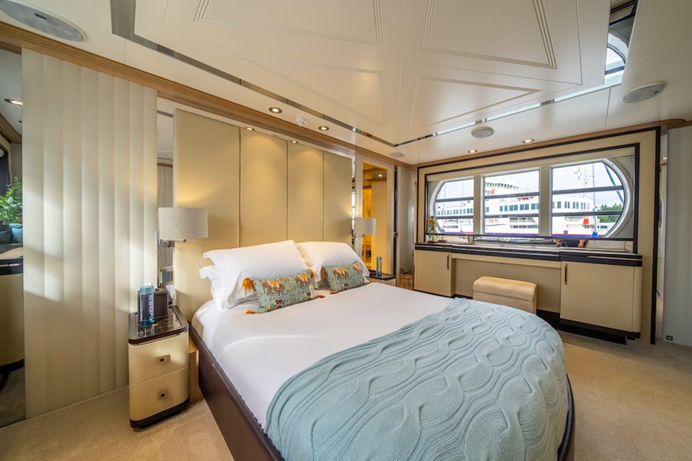 a bed in a room aboard LA MASCARADE Yacht for Sale