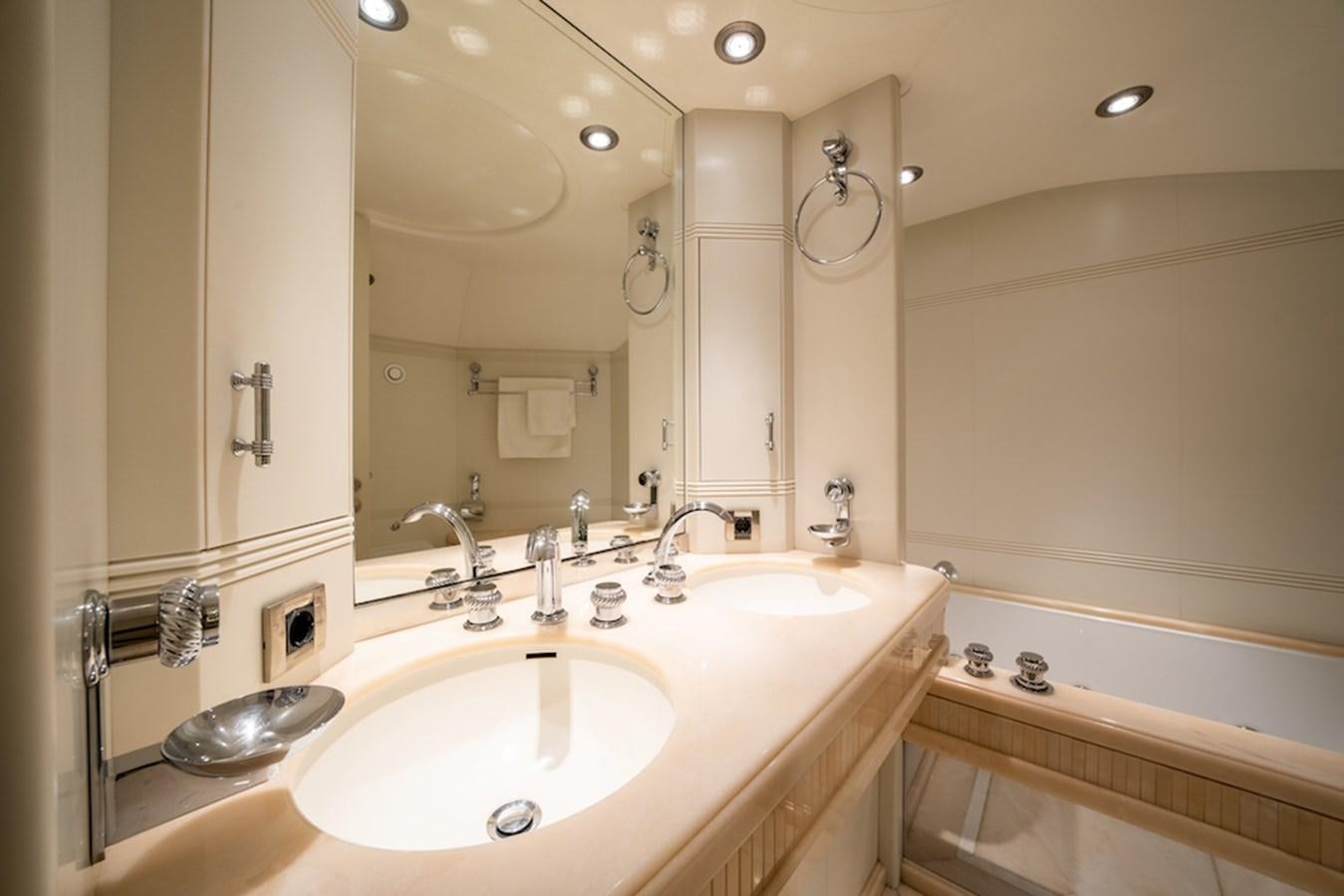 a bathroom with two sinks aboard LA MASCARADE Yacht for Sale