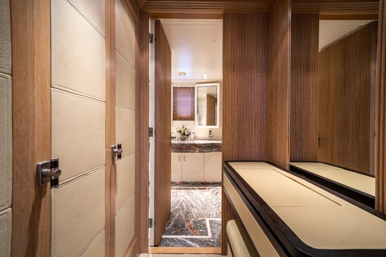 a bathroom with a sink and a mirror aboard LA MASCARADE Yacht for Sale