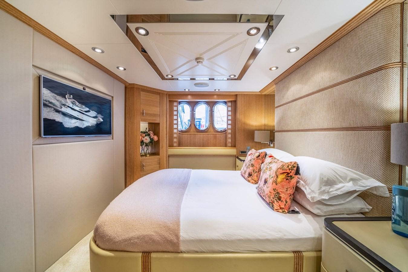 a bed in a room aboard LA MASCARADE Yacht for Sale