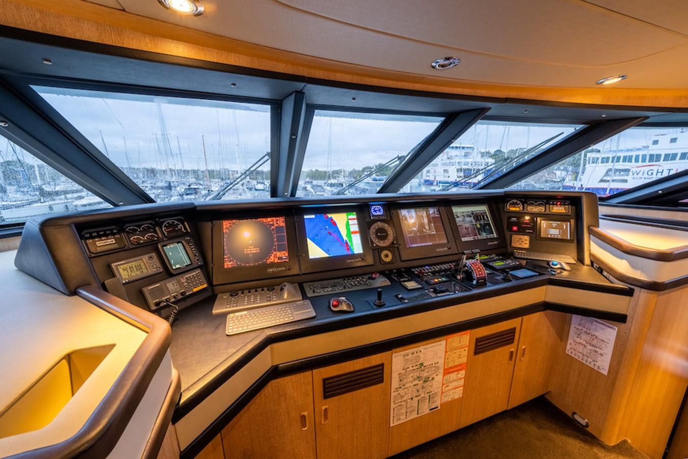 a control room with many monitors aboard LA MASCARADE Yacht for Sale