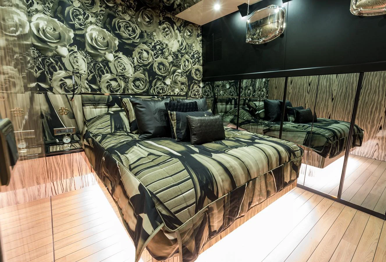 a bed in a room aboard EMANUEL Yacht for Sale