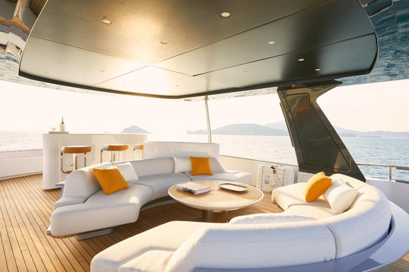 a room with a couch and a table and a large window aboard SHABBY Yacht for Sale