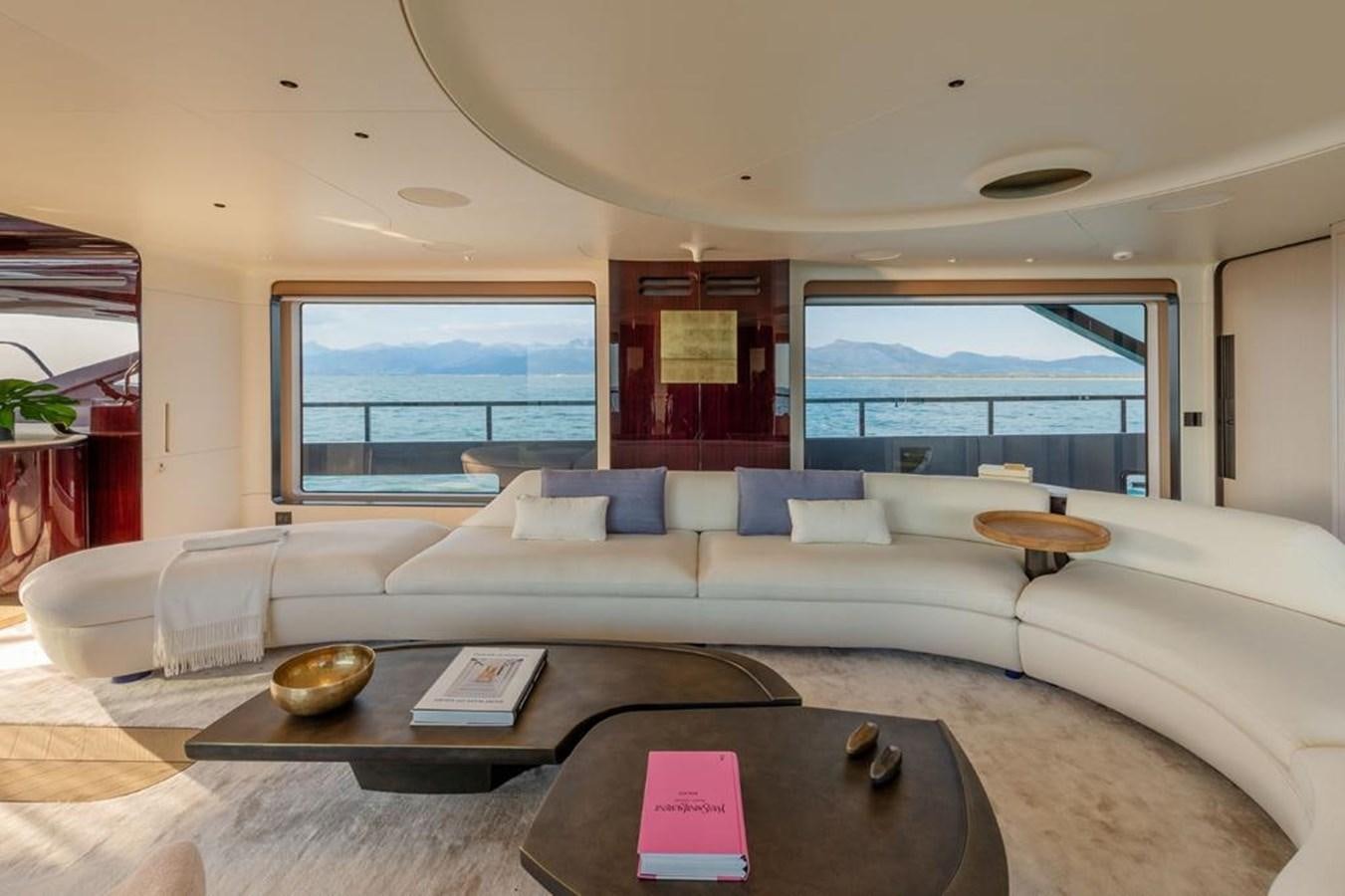 a living room with a large window aboard SHABBY Yacht for Sale
