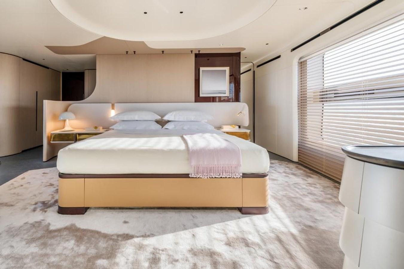 a room with a bed and a window aboard SHABBY Yacht for Sale