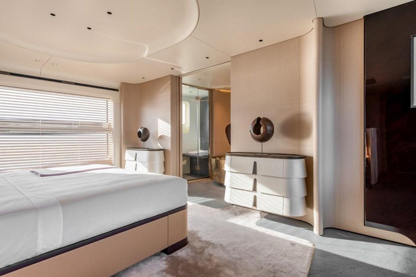 a bedroom with a bed and a sink aboard SHABBY Yacht for Sale