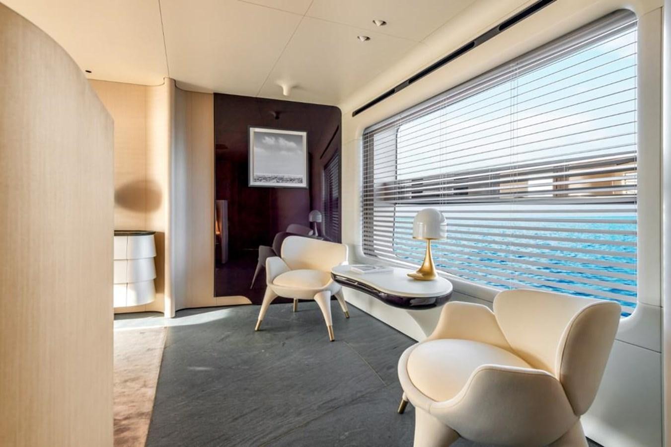 a room with a table and chairs aboard SHABBY Yacht for Sale