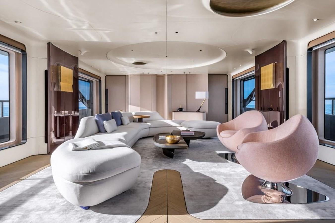 a room with a large white couch and a large white rug aboard SHABBY Yacht for Sale