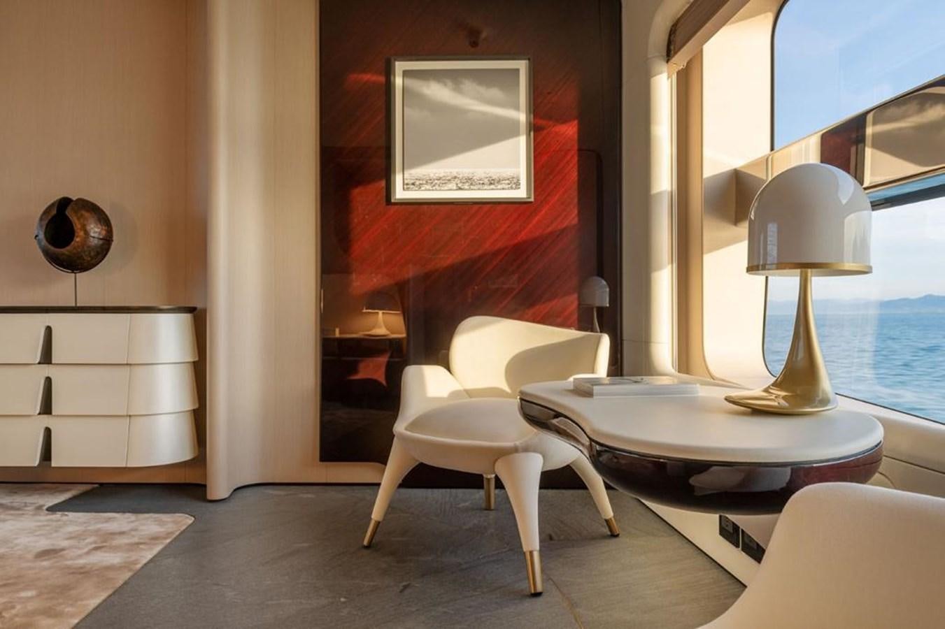 a room with a table and chairs aboard SHABBY Yacht for Sale