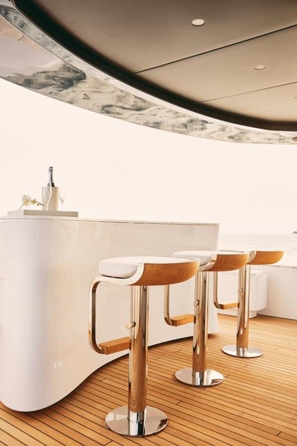 a white table with stools aboard SHABBY Yacht for Sale
