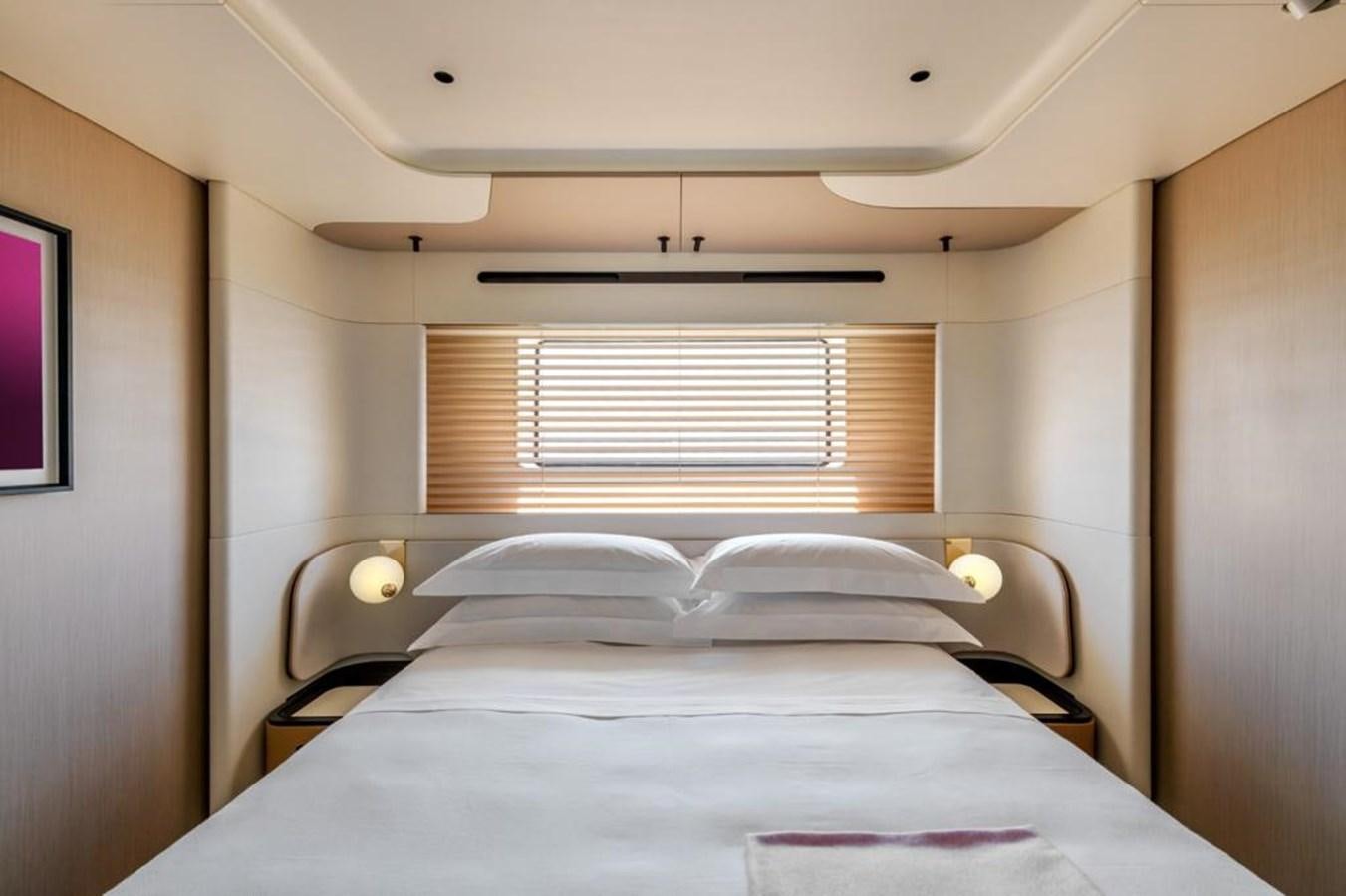 a bed with a white sheet aboard SHABBY Yacht for Sale