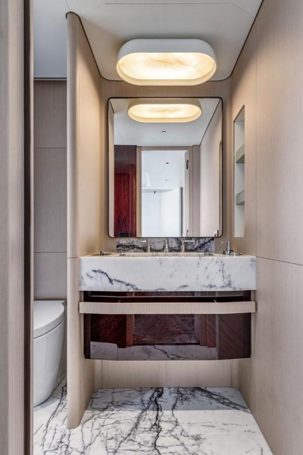 a bathroom with a large mirror aboard SHABBY Yacht for Sale