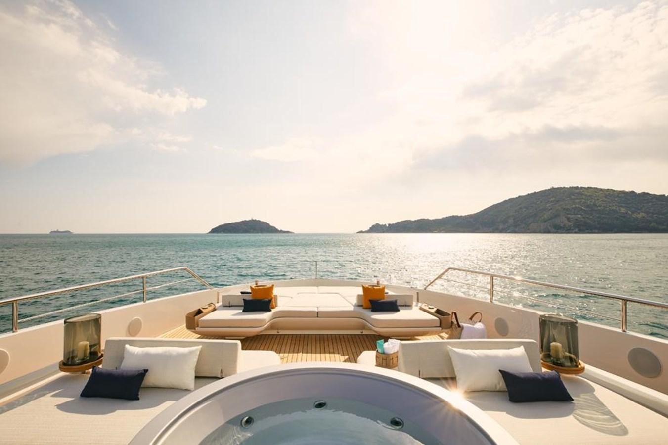a large white boat on a body of water aboard SHABBY Yacht for Sale