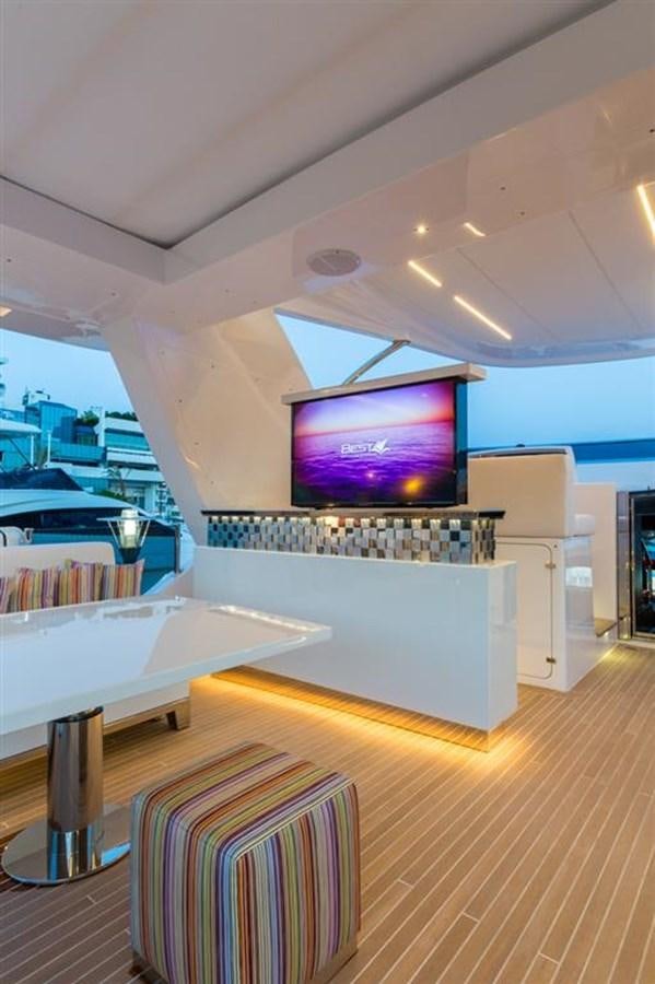 a room with a large tv aboard GALA Yacht for Sale