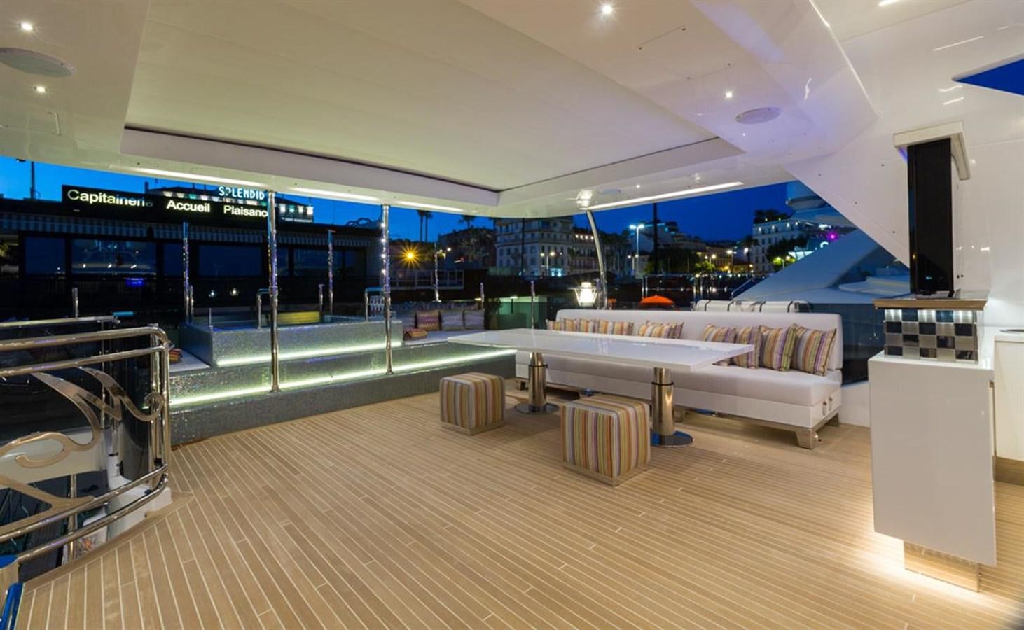 a large room with a couch and a table aboard GALA Yacht for Sale