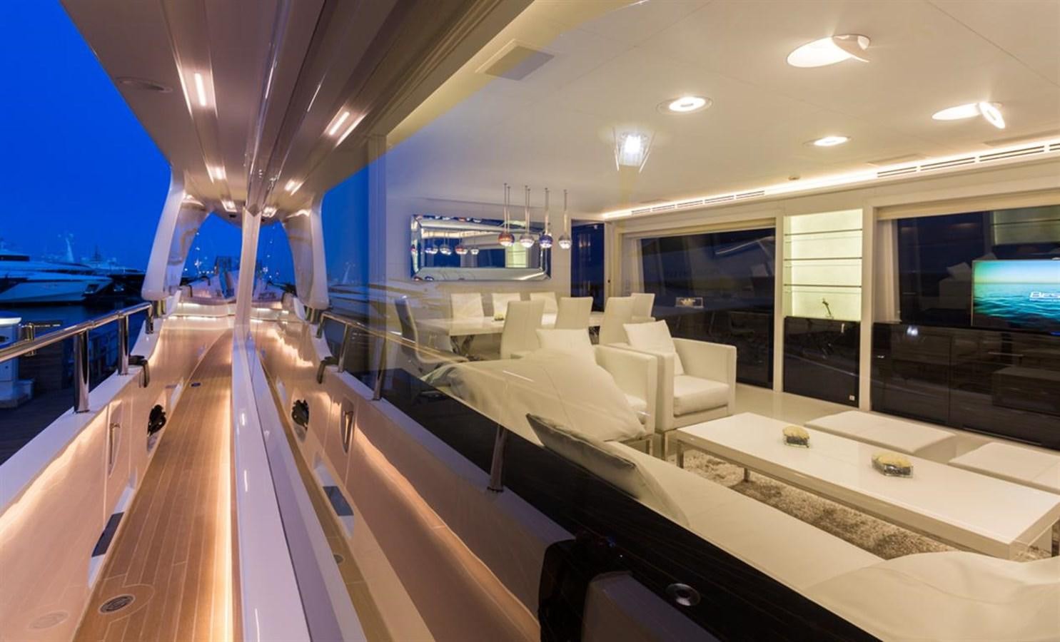 a room with a large group of tables and chairs aboard GALA Yacht for Sale