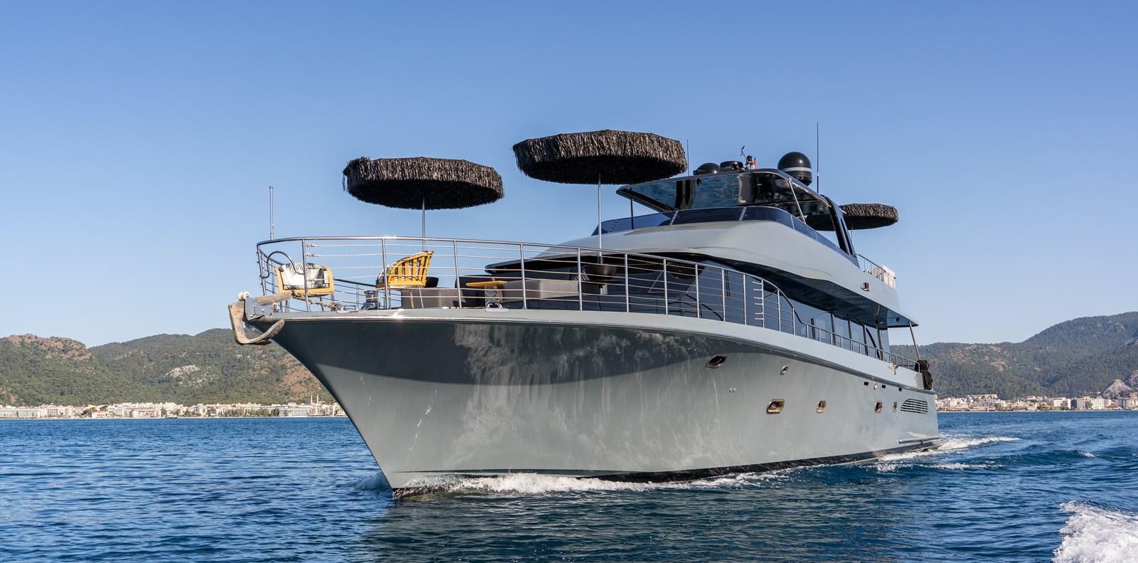 a large boat in the water aboard QUEEN KARINA Yacht for Sale