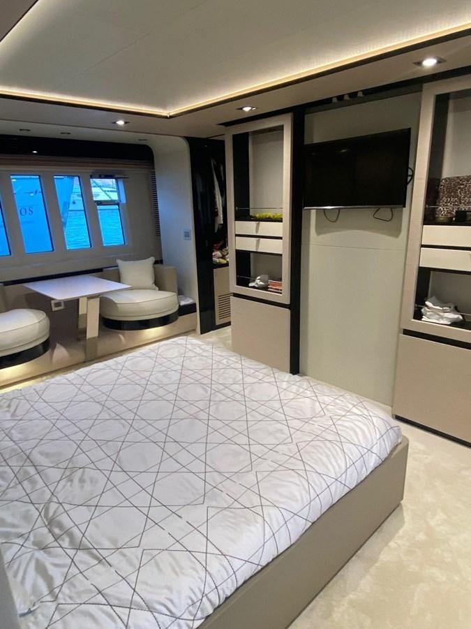 a bedroom with a large bed aboard FREE MIND Yacht for Sale