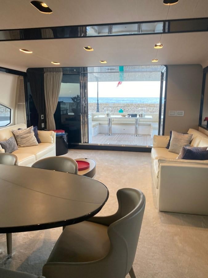 a living room with a large window aboard FREE MIND Yacht for Sale