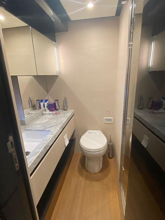 a bathroom with a sink and a toilet aboard FREE MIND Yacht for Sale