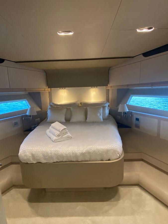 a bed in a room aboard FREE MIND Yacht for Sale