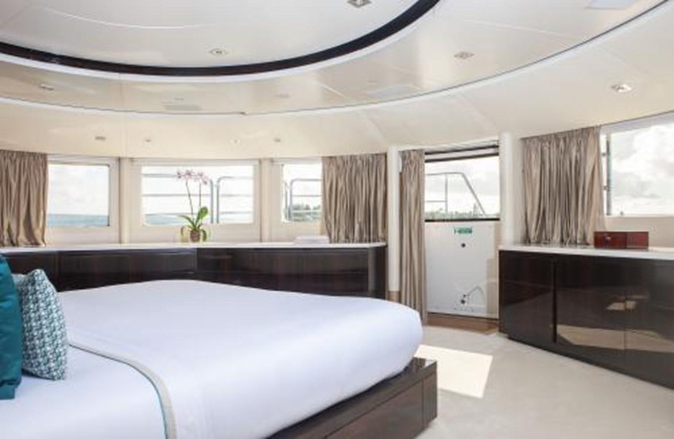 a large bedroom with a large bed aboard SUR LA MER Yacht for Sale