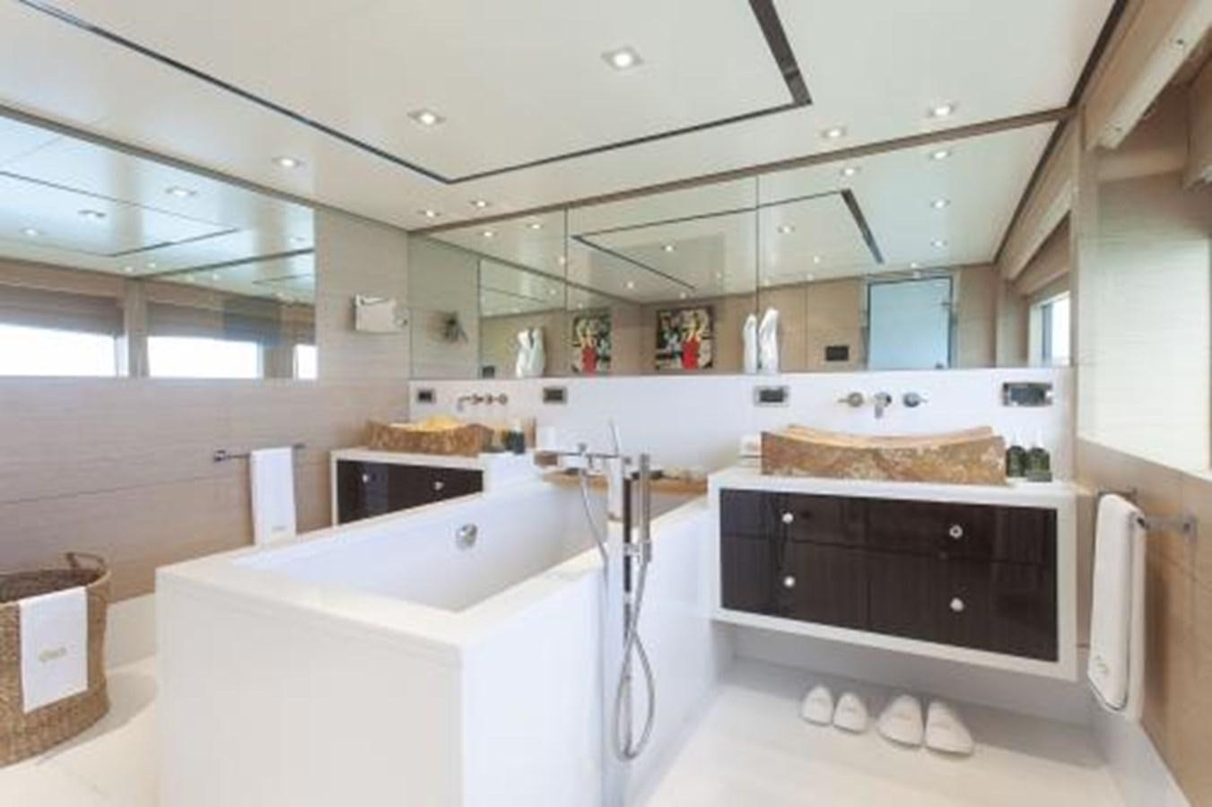 a kitchen with a marble counter top aboard SUR LA MER Yacht for Sale