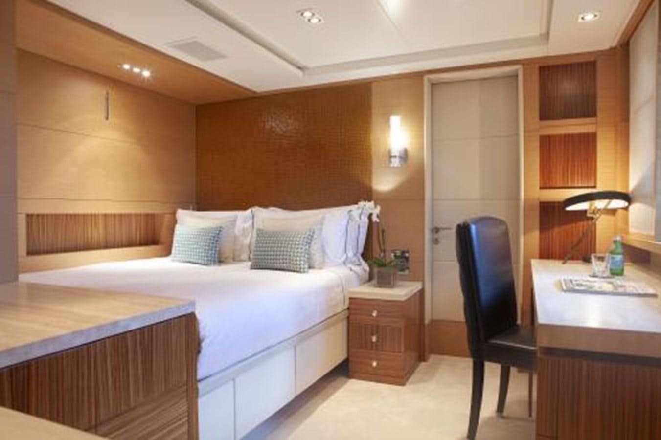 a bed in a room aboard SUR LA MER Yacht for Sale
