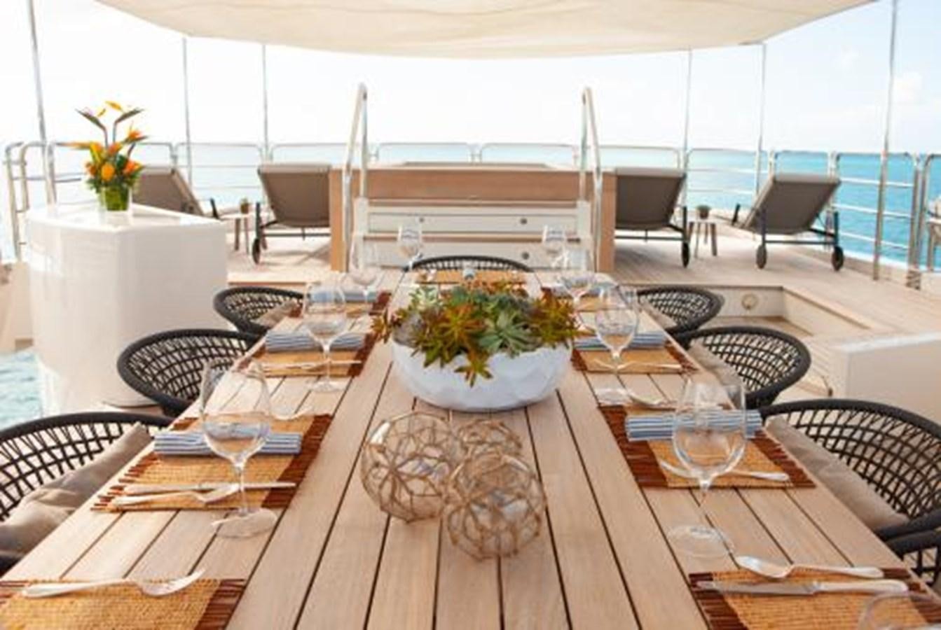 a table with place settings aboard SUR LA MER Yacht for Sale