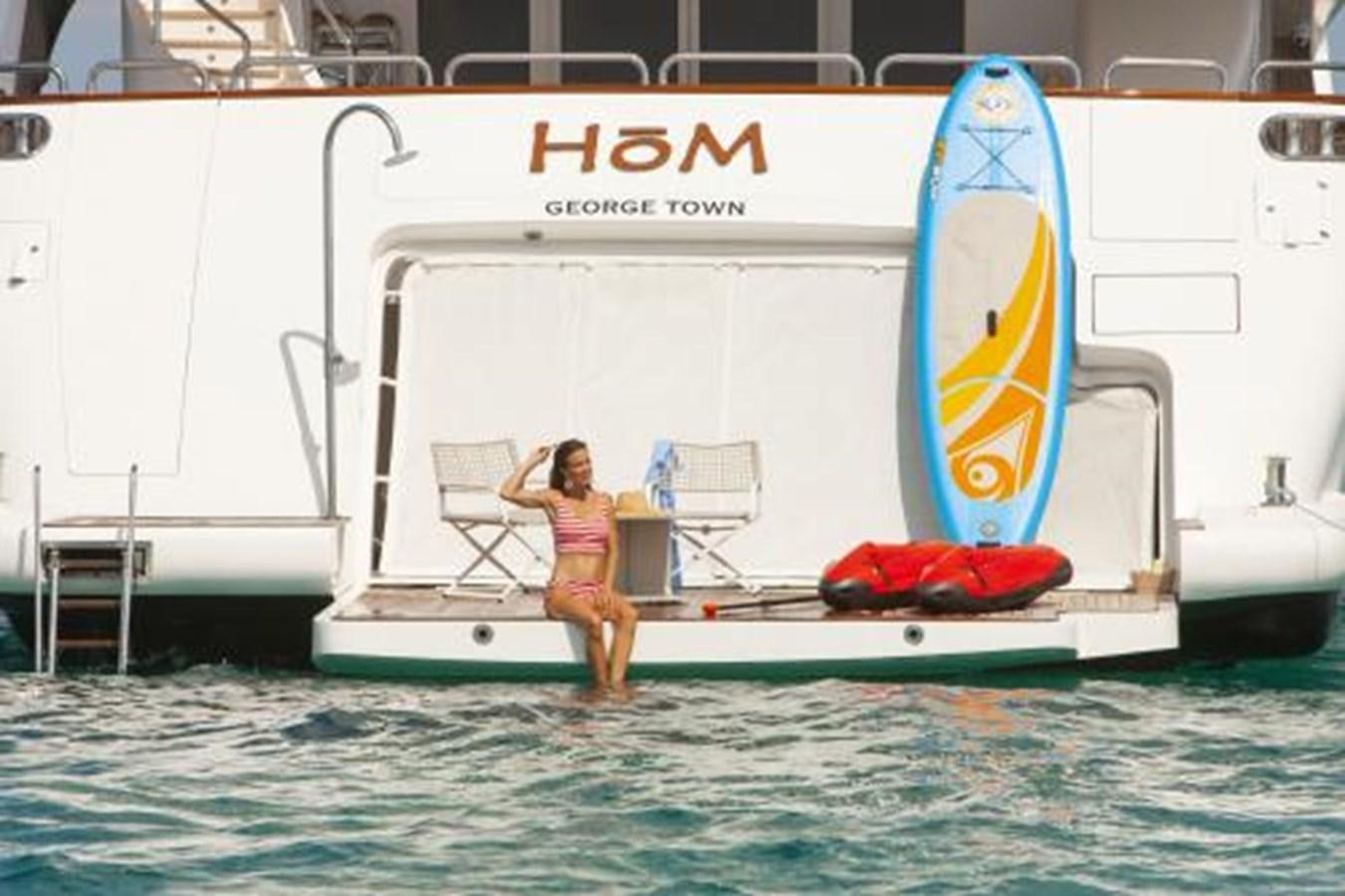 a person standing on a boat aboard SUR LA MER Yacht for Sale