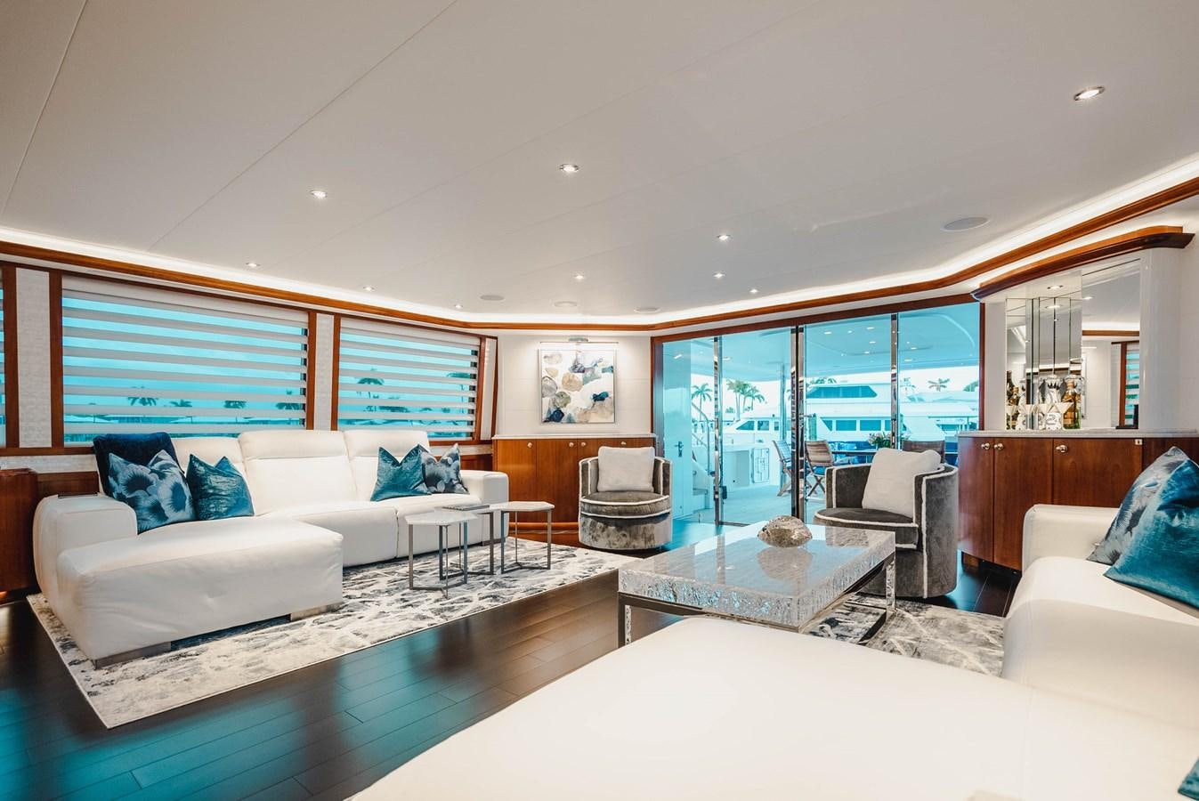 a living room with a large window aboard LA LADY Yacht for Sale