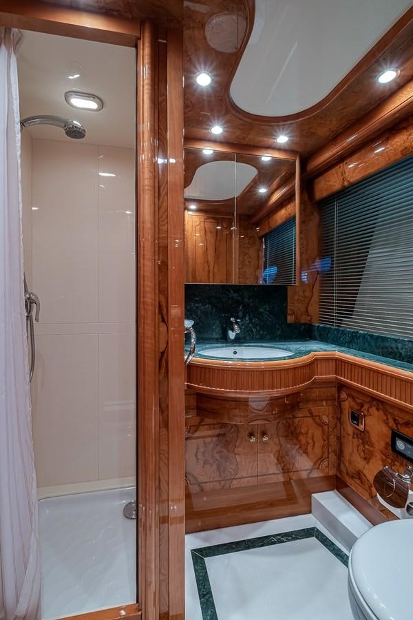 a bathroom with a tub and shower aboard LADY ADELHEID Yacht for Sale