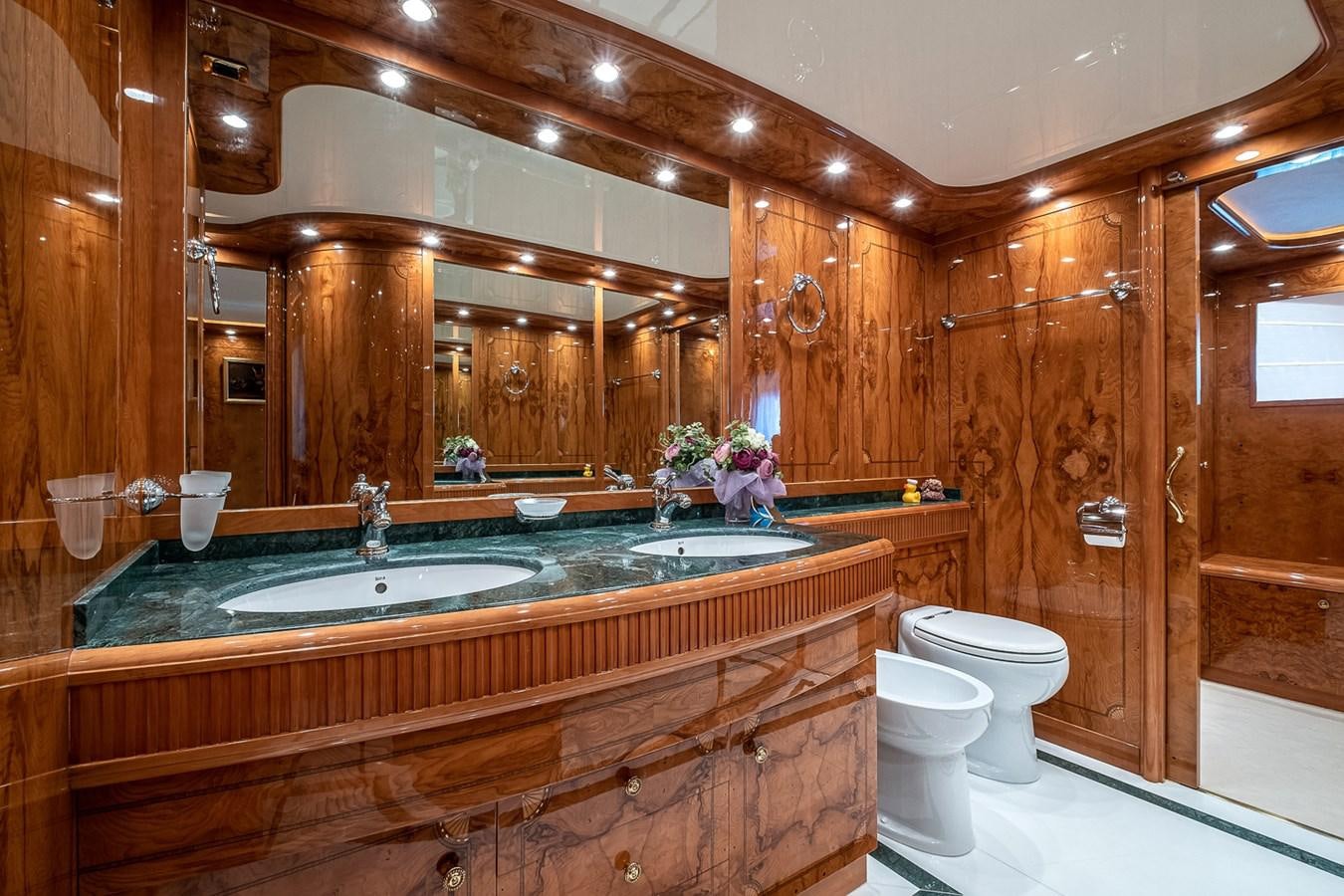 a bathroom with a large mirror aboard LADY ADELHEID Yacht for Sale
