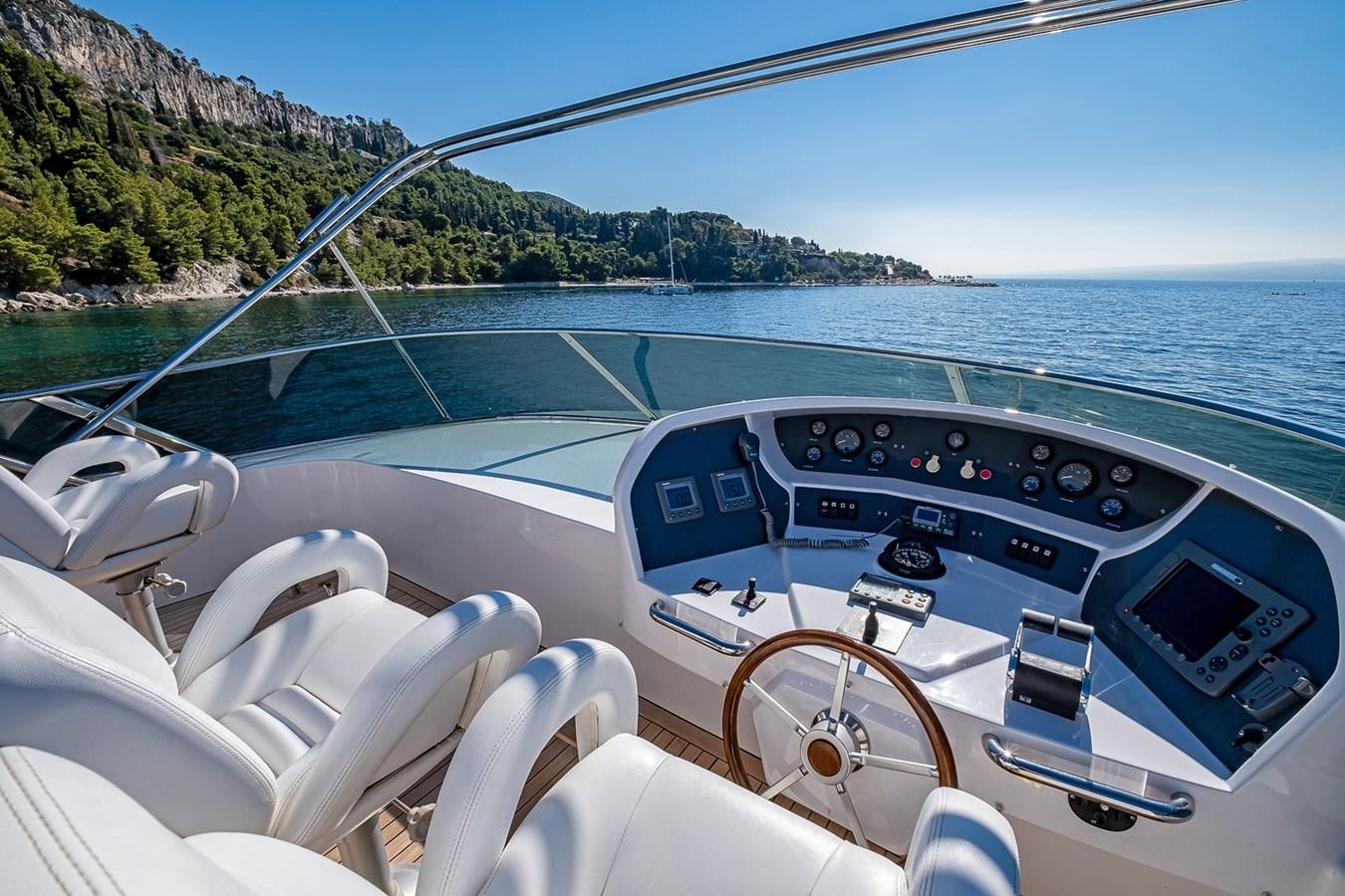 a boat with a view of the water and land below aboard LADY ADELHEID Yacht for Sale