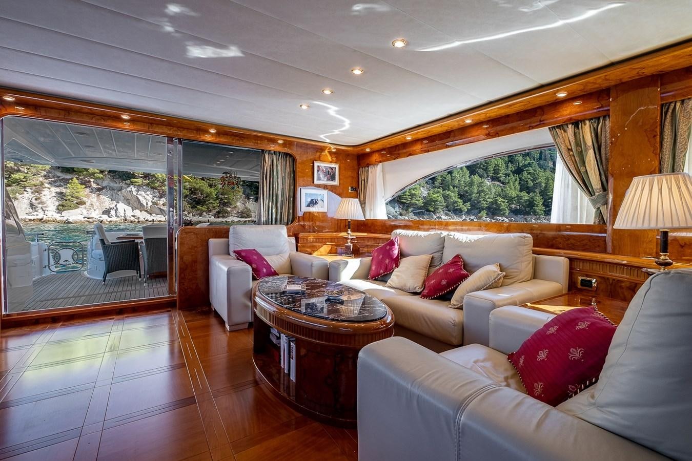 a living room with a large window aboard LADY ADELHEID Yacht for Sale