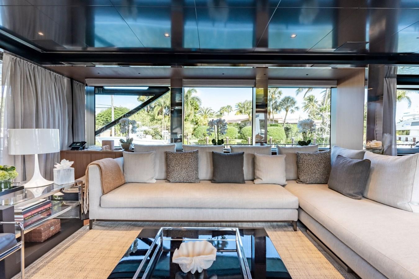 a living room with a large window aboard BEYOND BEYOND Yacht for Sale