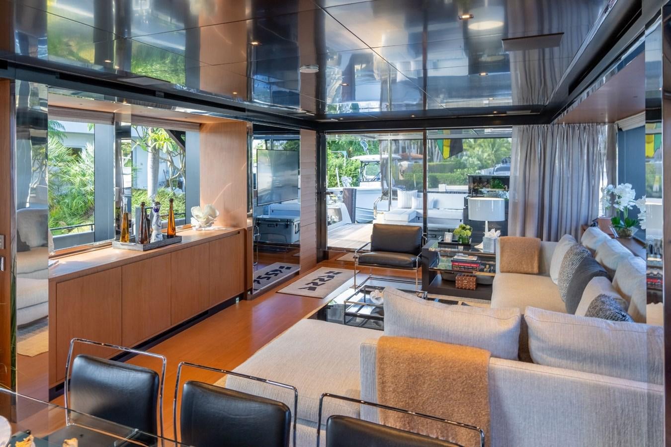 a living room with a large window aboard BEYOND BEYOND Yacht for Sale