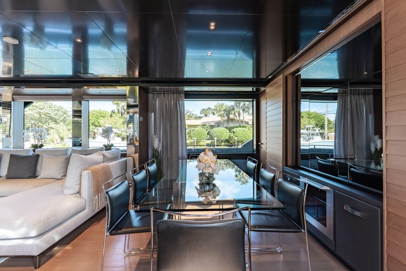 a living room with a large window aboard BEYOND BEYOND Yacht for Sale