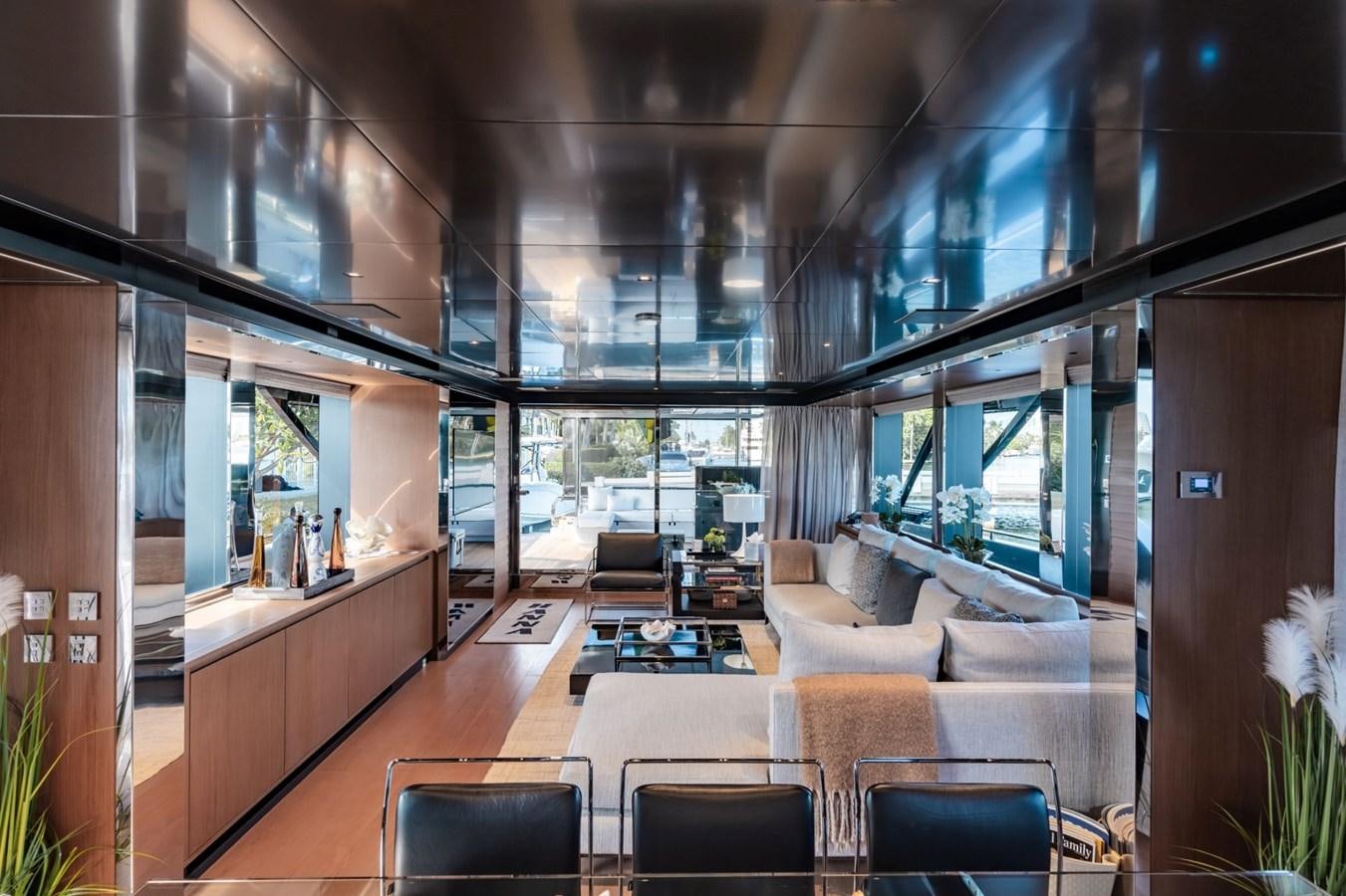 a living room with a large window aboard BEYOND BEYOND Yacht for Sale