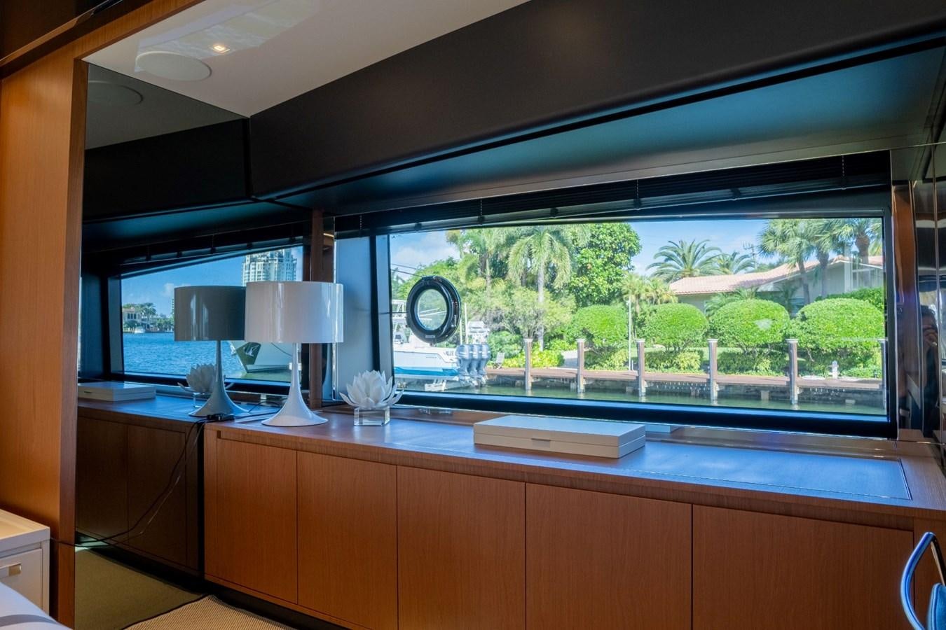 a kitchen with a large window aboard BEYOND BEYOND Yacht for Sale