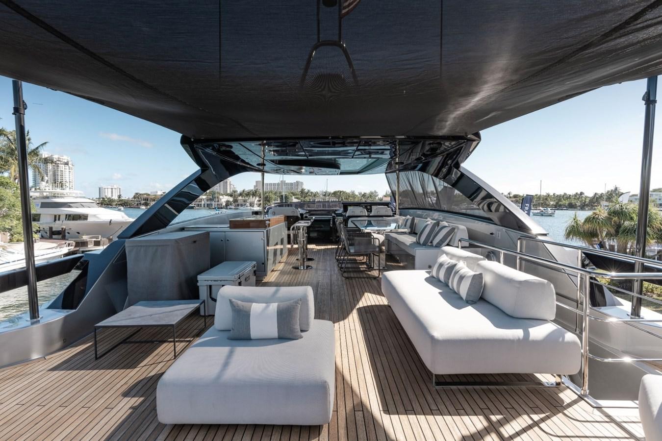 a deck with a lounge chair and a large body of water aboard BEYOND BEYOND Yacht for Sale