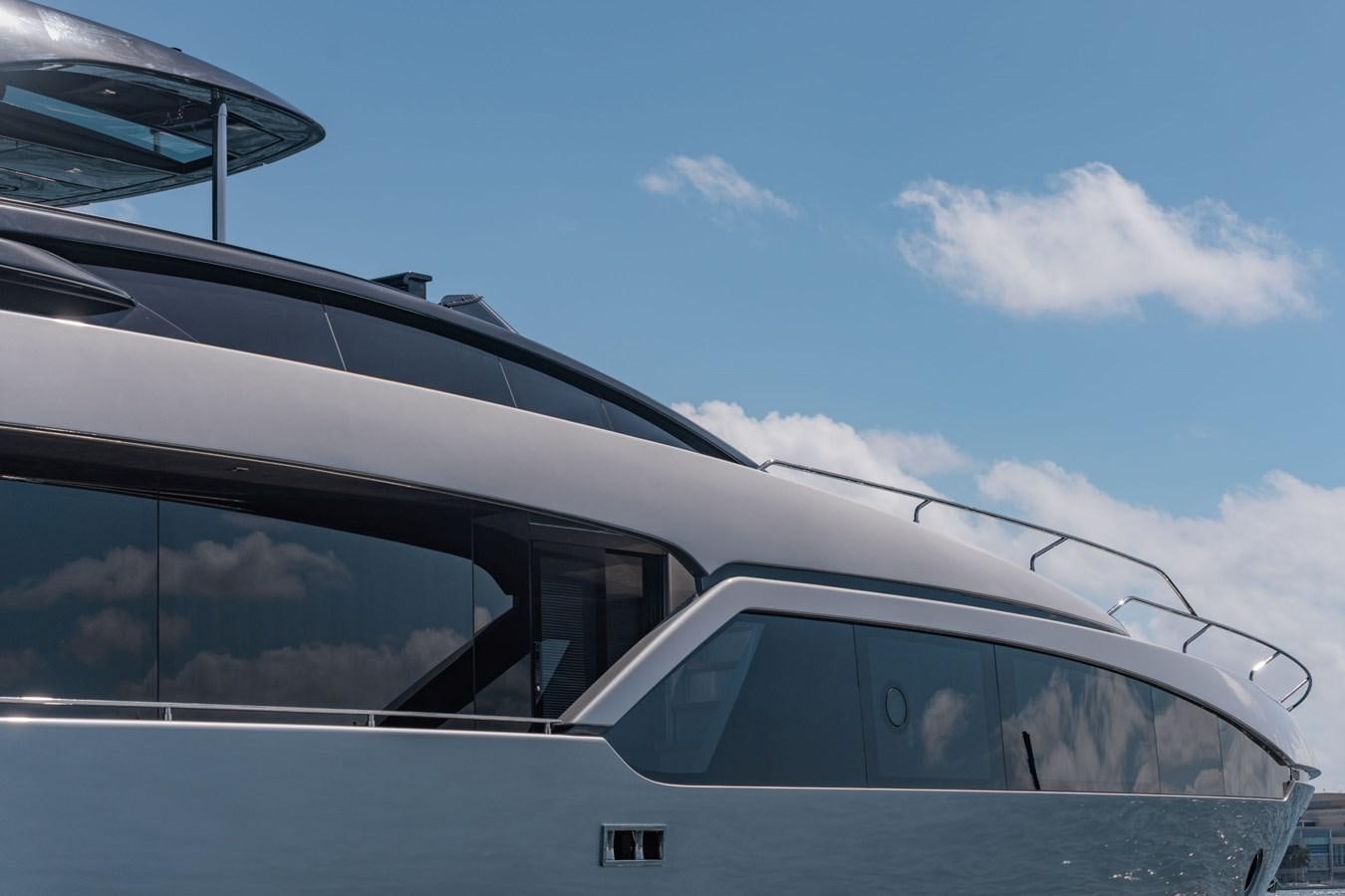 a car with the door open aboard BEYOND BEYOND Yacht for Sale