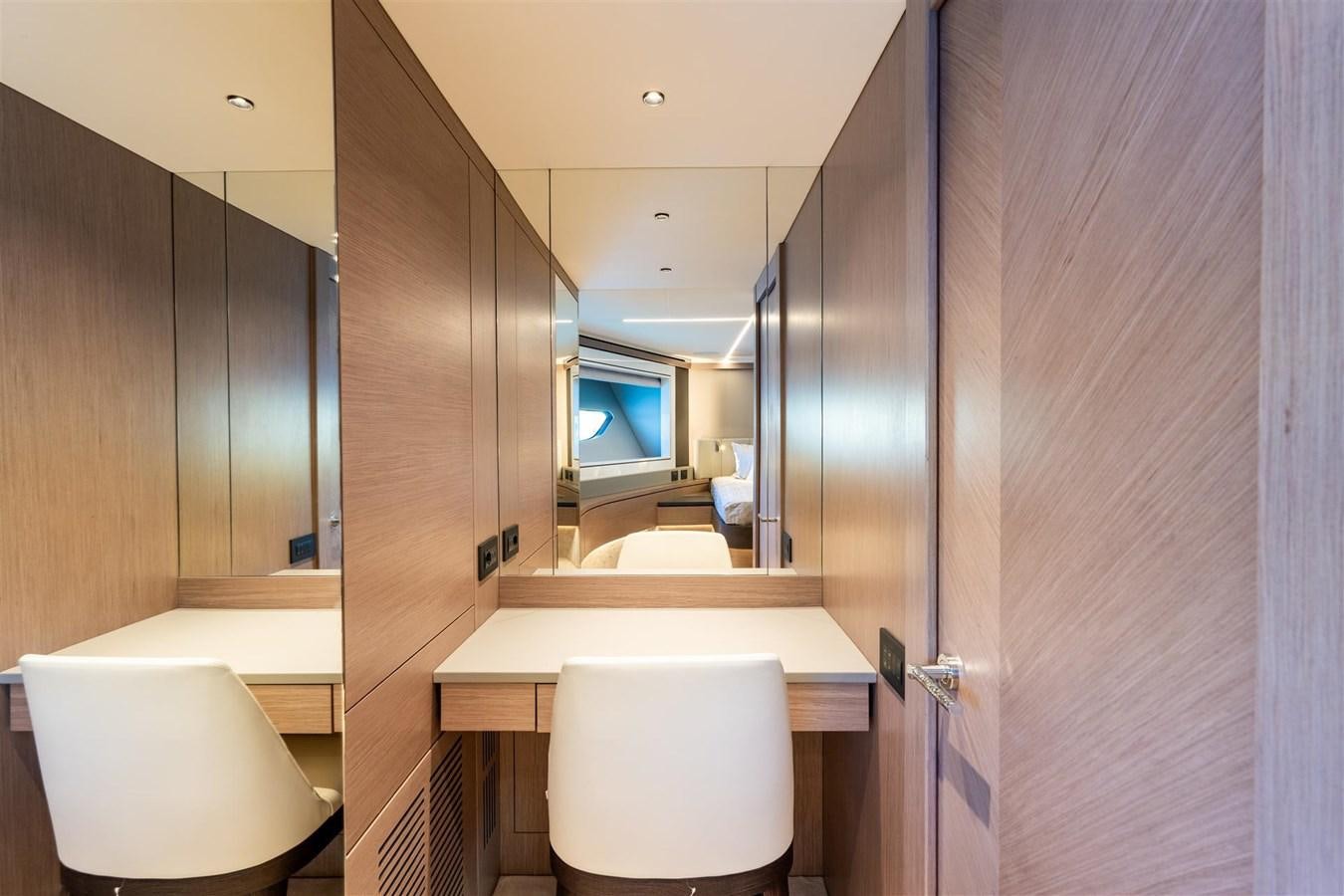 a bathroom with a glass shower aboard WORTH THE WAIT Yacht for Sale
